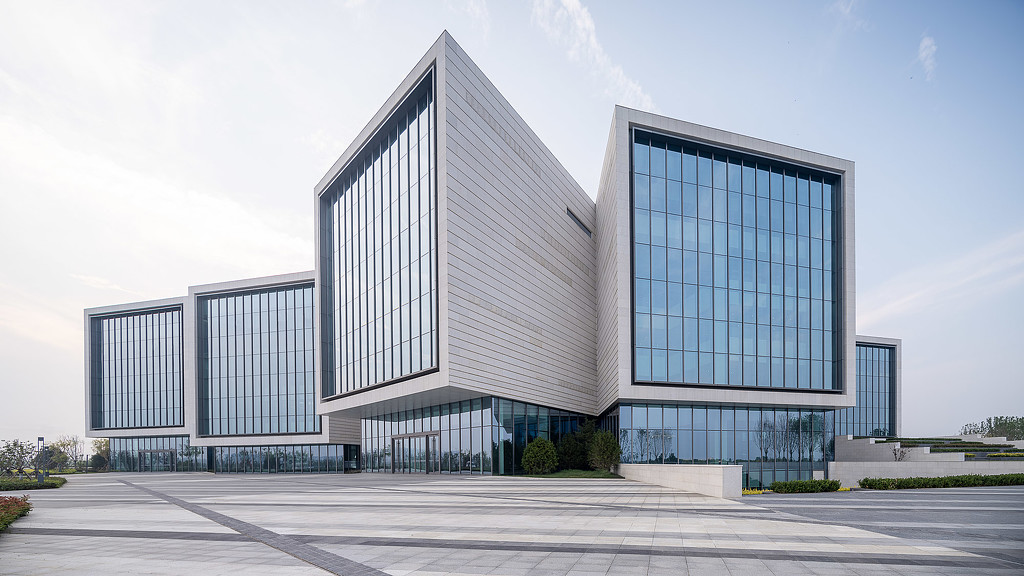 Exterior of a building with glass windows.